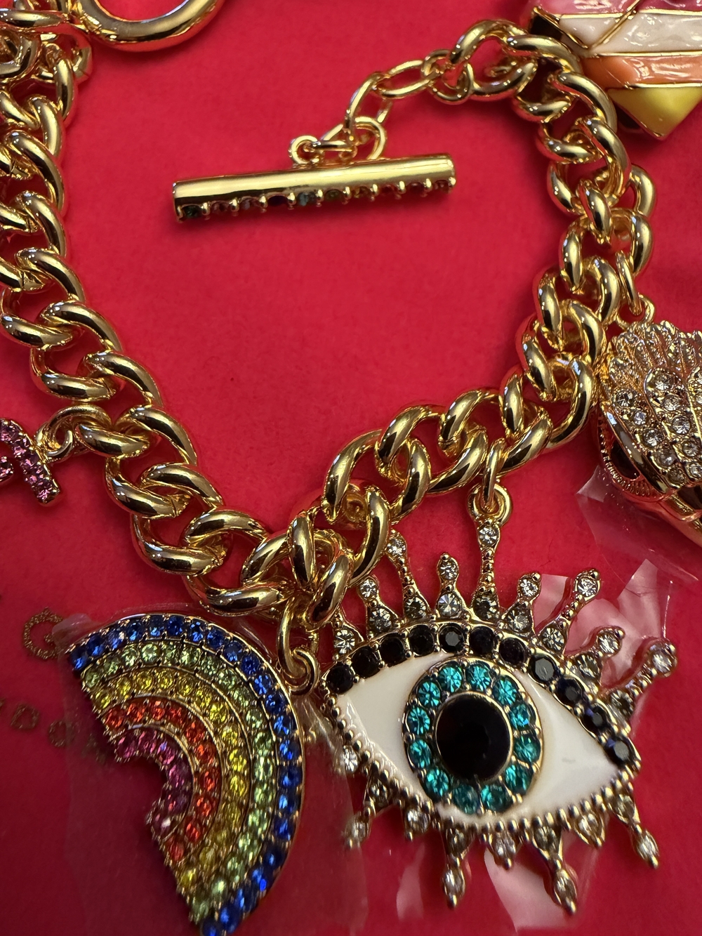 Kurt Geiger Gold-Tone Charm Bracelet with Multicolor Eye & Rainbow Charms